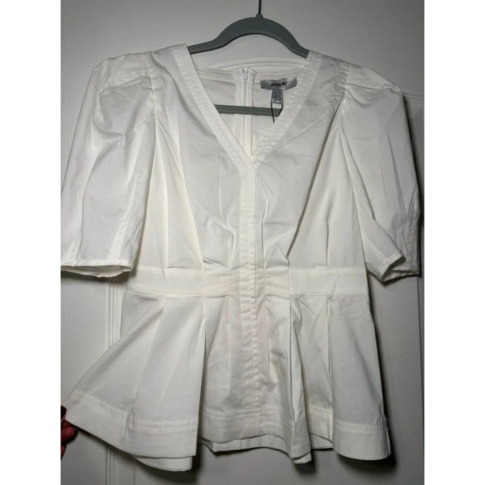 NWT peplum ivory top